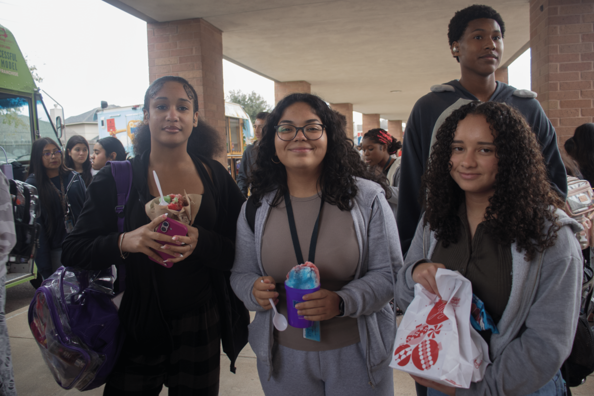 Students enjoying food purchased at the food truck friday event.